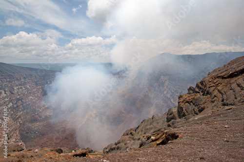 Masaya Volcano emitting large quantities of sulfur dioxide gas from active Santiago crater in Masaya, Nicaragua, Central America. photo