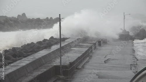 Hurricane Storm Surge Waves Crash Into And Flooding Fishing Harbor - Hagibis photo