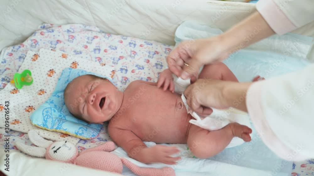 Baby Five Days Old Mother Parent Changes Diaper And Diapers In Bedroom