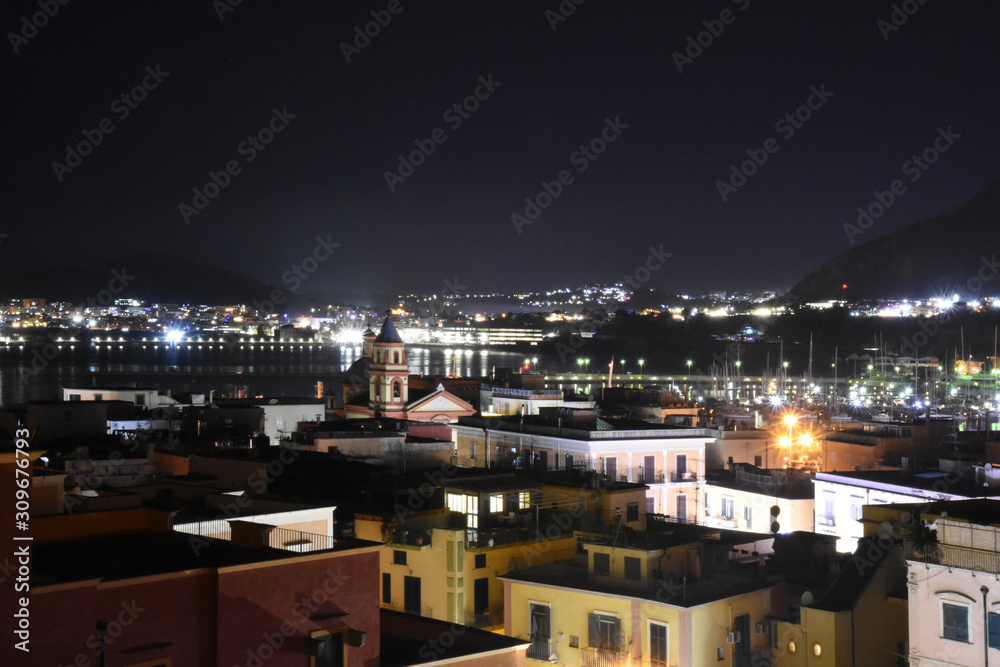Naklejka premium Night view of the town of Pozzuoli, Italy