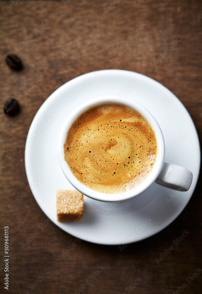 Cup of coffee on rustic background. Top view. Cup of coffee on rustic background. Top view.