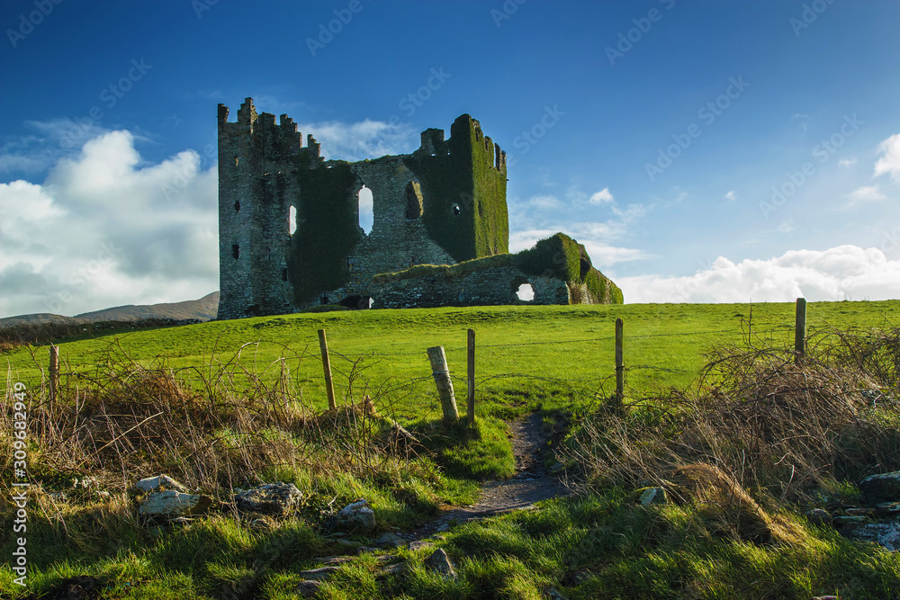 Ballycarberry Castle ruins in a sunny day with blue sky, in Kerry, Ireland, Europe.