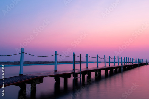 Wooden pier around Narrabeen rock pool in the morning, Sydney, Australia. © AlexandraDaryl