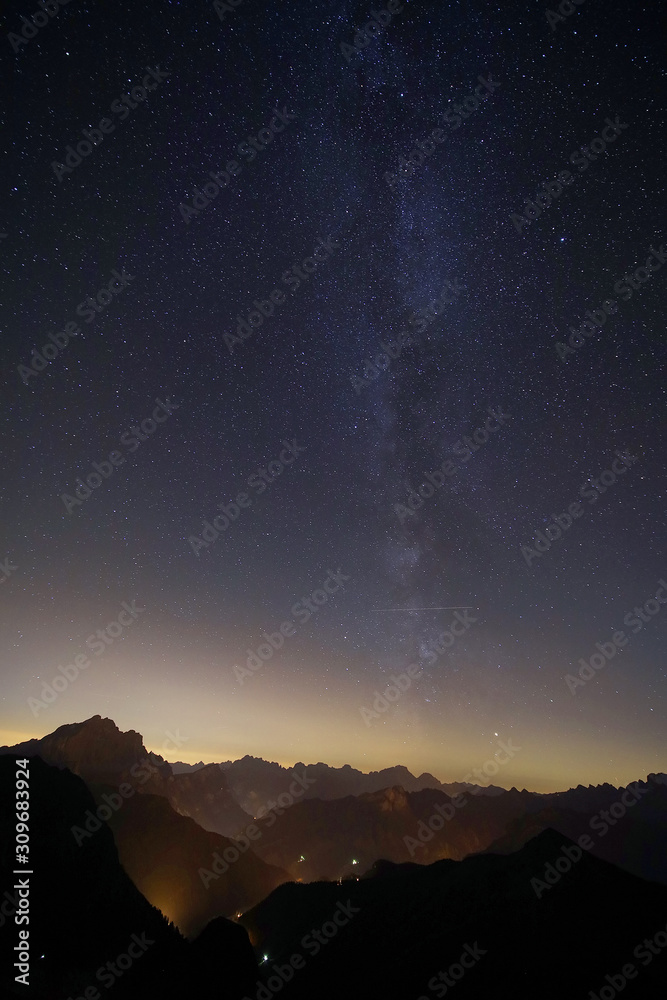 Fototapeta premium Night sky over the Dolomites, Italy, Europe. On exposure shot