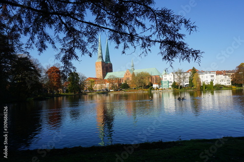 a nice view of the pond Mühlenteich and the cathedral photo