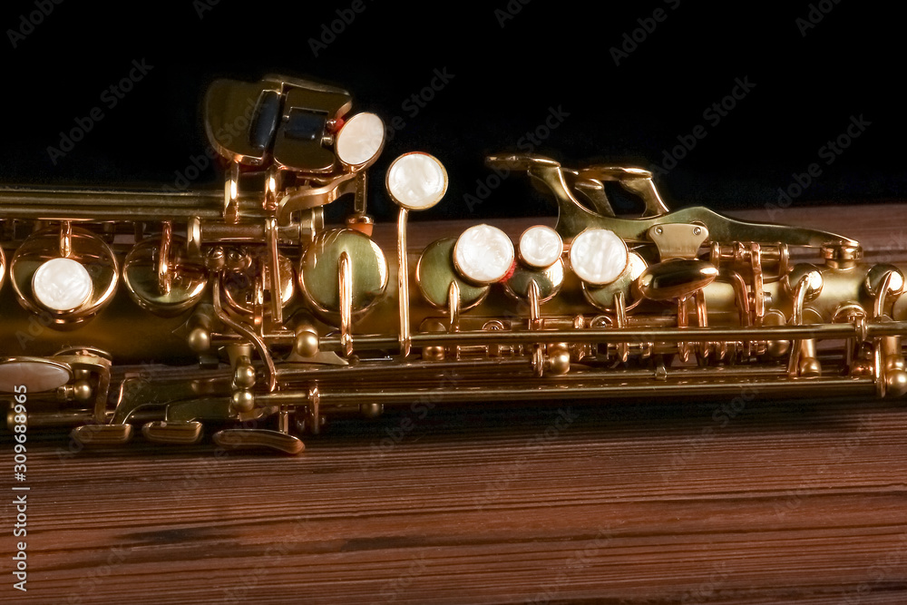 Obraz premium soprano saxophone on black background