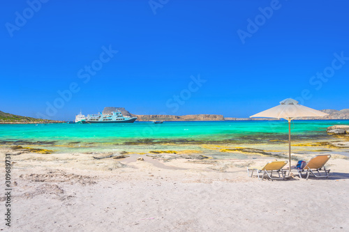 Amazing view of Balos Lagoon withmagical turquoise waters, lagoons, tropical beaches of pure white sand and Gramvousa island on Crete, Greece © gatsi
