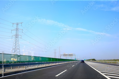 Beautiful highway  under the blue sky and white clouds