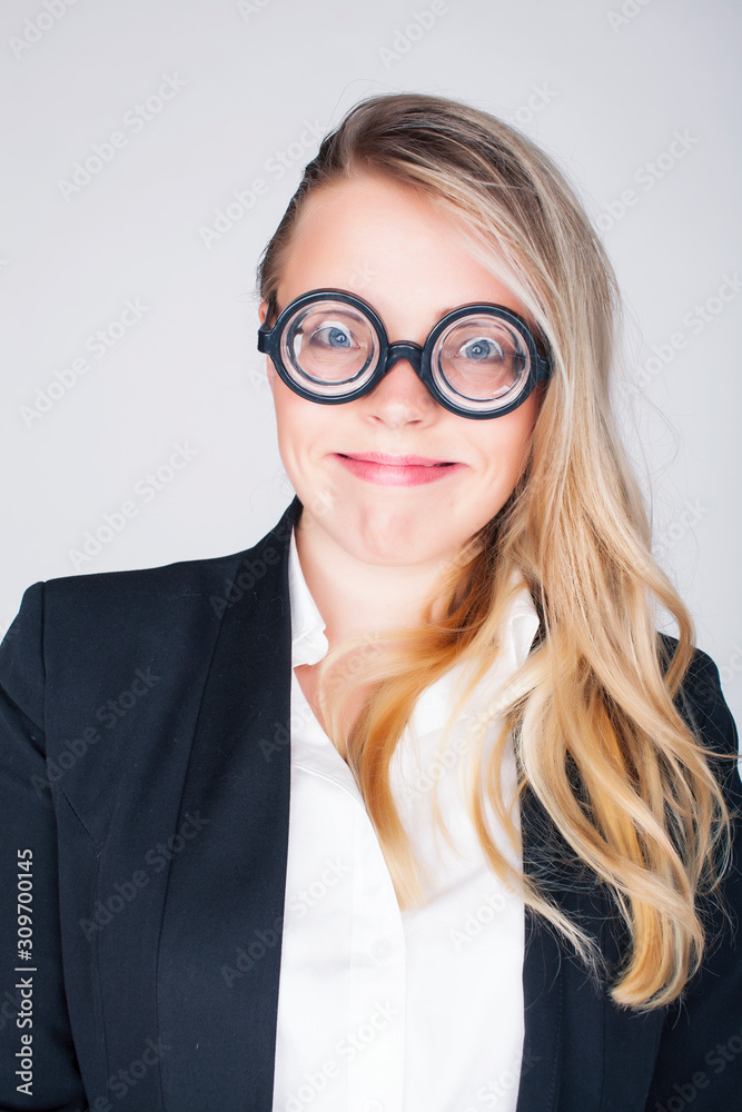 bookworm, cute young blond woman in glasses, blond hair, teenage goofy, lifestyle people concept