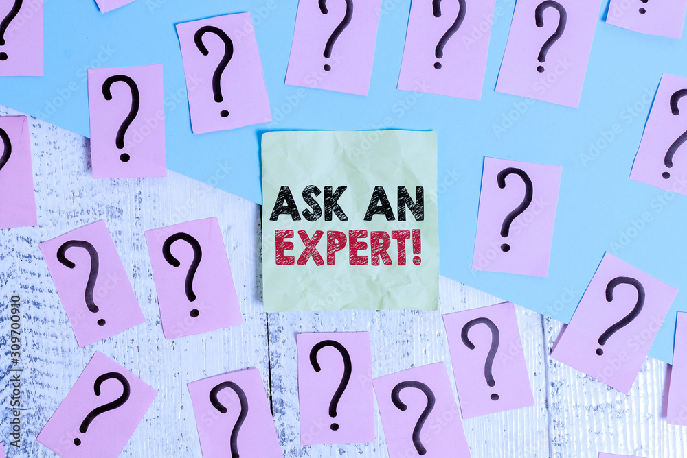 Text sign showing Ask An Expert. Business photo text confirmation that have read understand and agree with guidelines Scribbled and crumbling papers with thick cardboard above wooden table Text sign showing Ask An Expert. Business photo text confirmation that have read understand and agree with guidelines Scribbled and crumbling papers with thick cardboard above wooden table