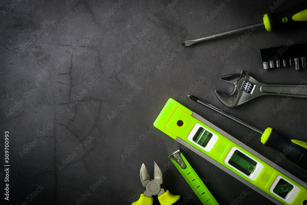 handyman services - black and green tools backgound