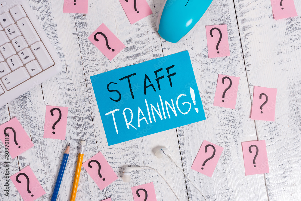Text sign showing Staff Training. Business photo text learn specific knowledge improve perforanalysisce in current roles Writing tools, computer stuff and scribbled paper on top of wooden table Text sign showing Staff Training. Business photo text learn specific knowledge improve perforanalysisce in current roles Writing tools, computer stuff and scribbled paper on top of wooden table