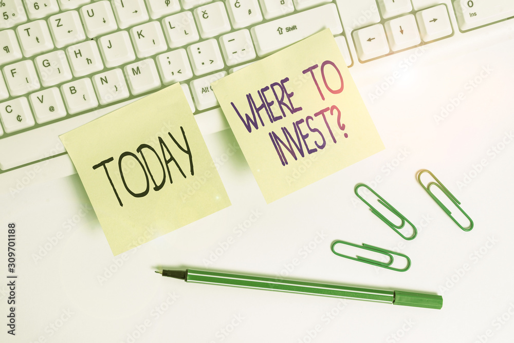 Word writing text Where To Invest Question. Business photo showcasing asking about where put money into financial schemes or shares Square green note paper with pencil on the white background Word writing text Where To Invest Question. Business photo showcasing asking about where put money into financial schemes or shares Square green note paper with pencil on the white background