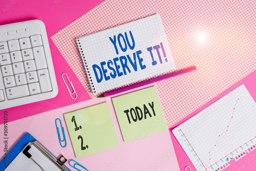 Conceptual hand writing showing You Deserve It. Concept meaning should have it because of their qualities or actions Writing equipments and computer stuffs placed on plain table Conceptual hand writing showing You Deserve It. Concept meaning should have it because of their qualities or actions Writing equipments and computer stuffs placed on plain table