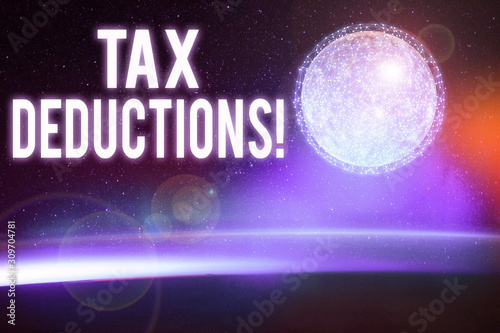 Conceptual hand writing showing Tax Deductions. Concept meaning reduction income that is able to be taxed of expenses Elements of this image furnished by NASA