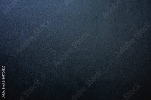 Plaster walls and black textured abstract background.