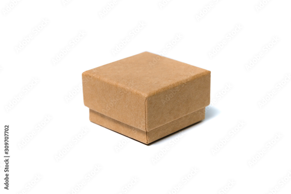 Empty small brown cardboard box with lid for mock up isolated on white. Empty small brown cardboard box with lid for mock up isolated on white.