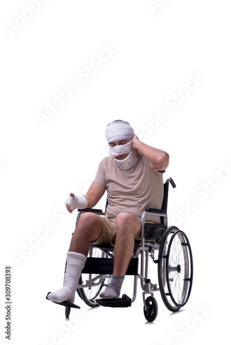 Injured man in wheel-chair isolated on white