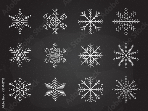 Icy snowflakes winter decoration collection vector illustration. Set of chalk sketch white snowflake icons on blackboard for new year celebration design or winter season festive ornament decoration