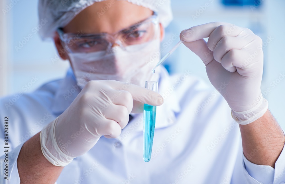 Female scientist researcher conducting an experiment in a labora Female scientist researcher conducting an experiment in a labora