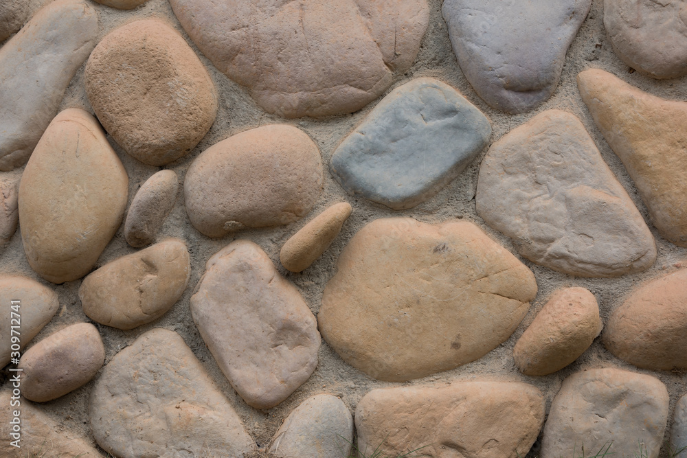 Colorful stone wall texture of various shapes Colorful stone wall texture of various shapes