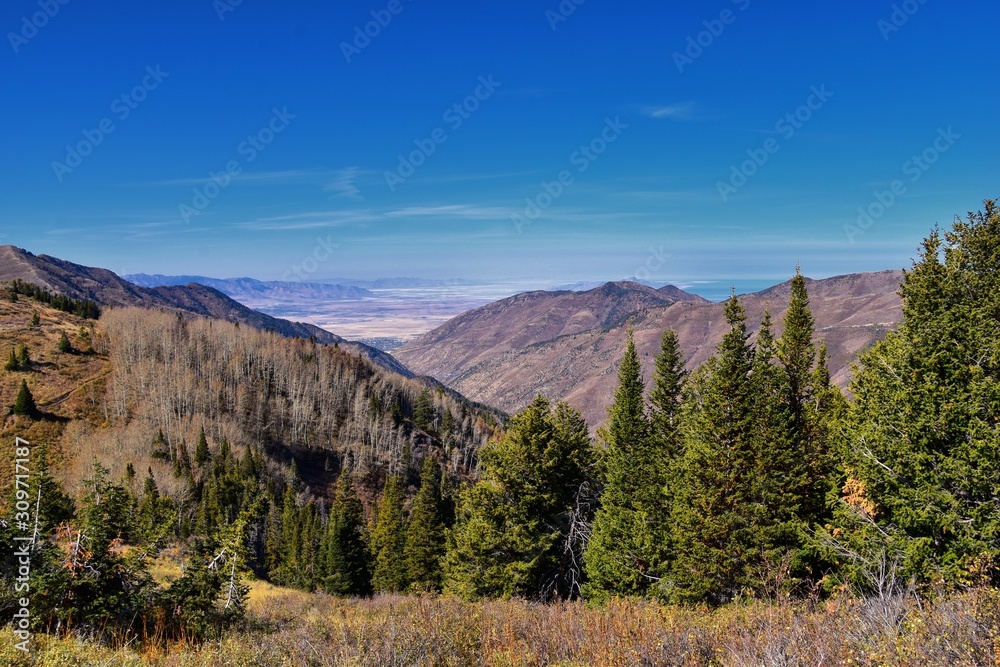 Landscape views of Tooele from the Oquirrh Mountains hiking and backpacking along the Wasatch Front Rocky Mountains, by Kennecott Rio Tinto Copper mine, by the Great Salt Lake in fall. Utah, America.