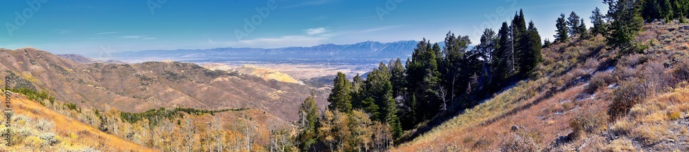 Landscape views of Tooele from the Oquirrh Mountains hiking and backpacking along the Wasatch Front Rocky Mountains, by Kennecott Rio Tinto Copper mine, by the Great Salt Lake in fall. Utah, America.