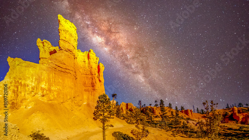Moonlight and the Milky Way stars over the Vermilion Colored Hoodoos along the Navajo Trail in Bryce Canyon National Park, Utah, United States
