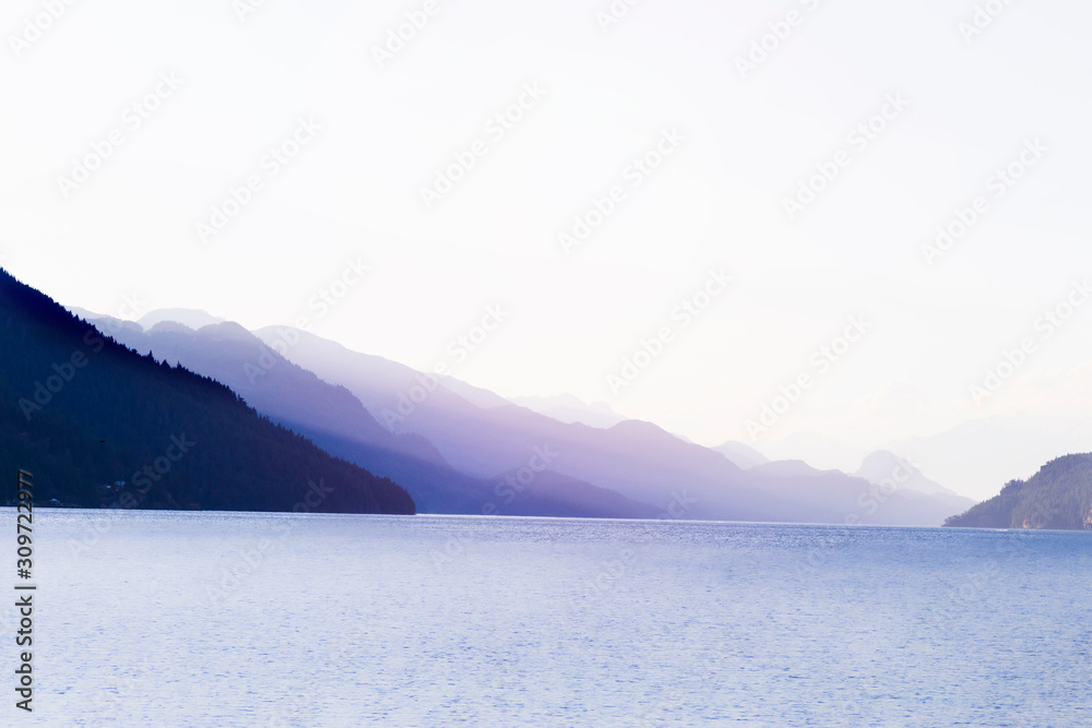 Harrison Lake at sunrise. Blue violet color trends.