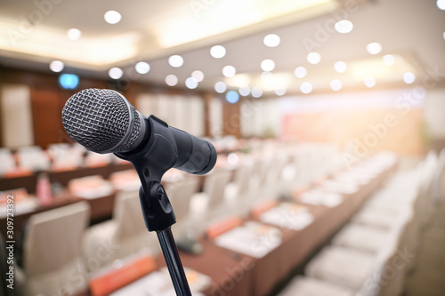 Microphone over the blurred business people forum Meeting Conference Training Learning Coaching Concept, Blurred background