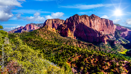 Sunrise over the red rocks of Timber Top Mountain in the Kolob Canyon part of Zion National Park, Utah, United Sates. Viewed from the Timber Creek Lookout at the top of the East Kolob Canyon Road