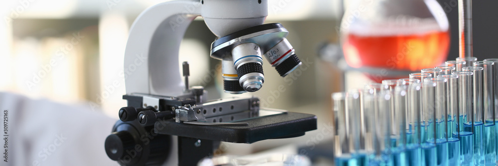 Head microscope on the background laboratory - obrazy, fototapety, plakaty 