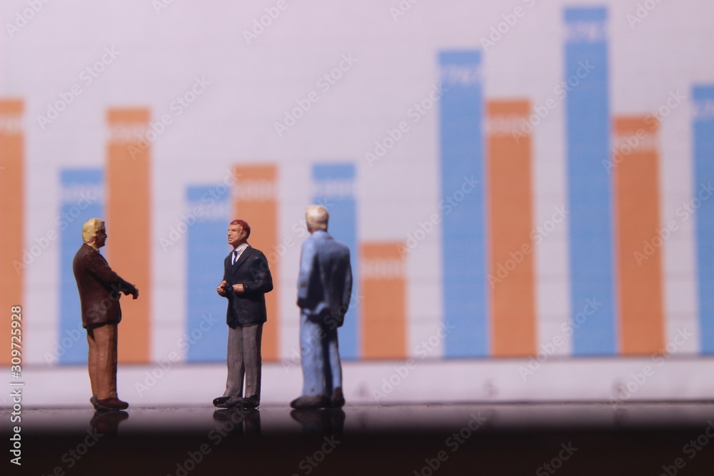 Fototapeta premium Simple Illustration Photo,Gruap of Man and Woman doing a Business meeting with graphic Chart as a background