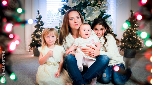 Christmas Close up Portrait of Beautiful Family, Happy Family Concept, Mother with Three Beautiful Girls 