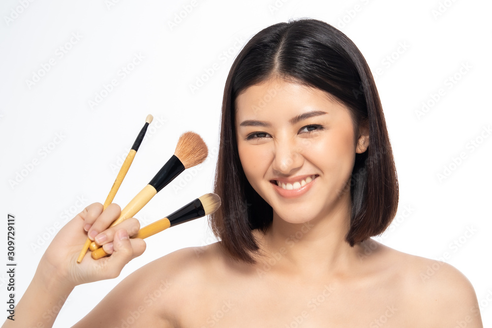 Beautiful Young Asian Woman short hair with Clean Fresh Skin. Face care, Facial treatment, Cosmetology, beauty and healthy skin and cosmetic ideas concept. Beautiful Young Asian Woman short hair with Clean Fresh Skin. Face care, Facial treatment, Cosmetology, beauty and healthy skin and cosmetic ideas concept.