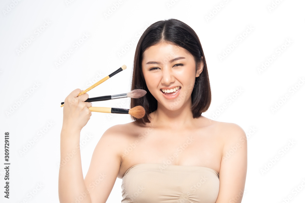 Beautiful Young Asian Woman short hair with Clean Fresh Skin. Face care, Facial treatment, Cosmetology, beauty and healthy skin and cosmetic ideas concept. Beautiful Young Asian Woman short hair with Clean Fresh Skin. Face care, Facial treatment, Cosmetology, beauty and healthy skin and cosmetic ideas concept.