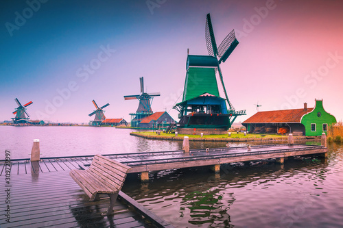 Old dutch windmills in Zaanse Schans at sunrise, Zaandam, Netherlands