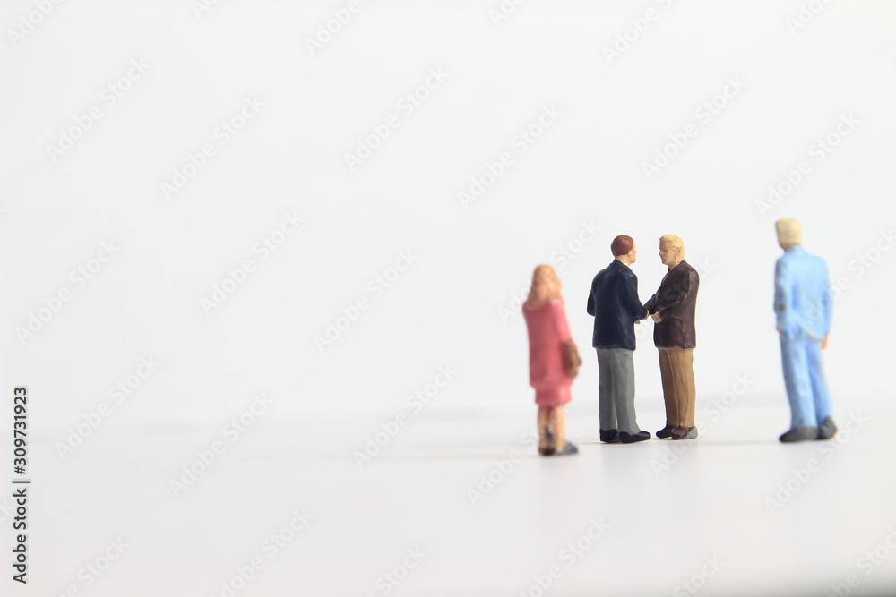 Gray Backgrond, Simple Illustration Photo for Mini Figure Two Man Toy Handshaking for Business Agreement Beyond their partner Gray Backgrond, Simple Illustration Photo for Mini Figure Two Man Toy Handshaking for Business Agreement Beyond their partner