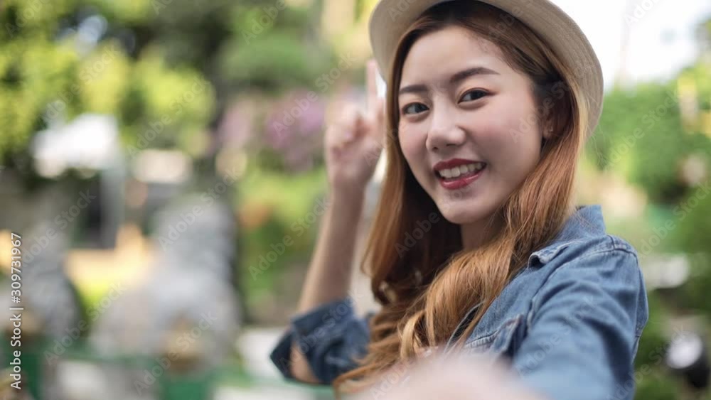 Traveler Asian blogger women travel in Bangkok, Thailand, beautiful female using mobile phone make vlog and live in social media .woman tourist making video call with smartphone while traveling . Traveler Asian blogger women travel in Bangkok, Thailand, beautiful female using mobile phone make vlog and live in social media .woman tourist making video call with smartphone while traveling .