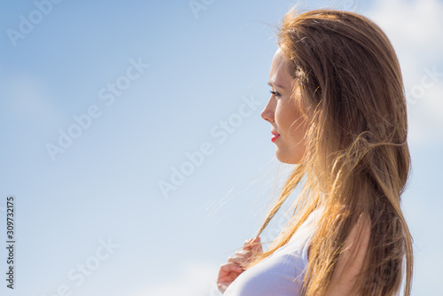Long hair girl portrait outdoor at sunny day