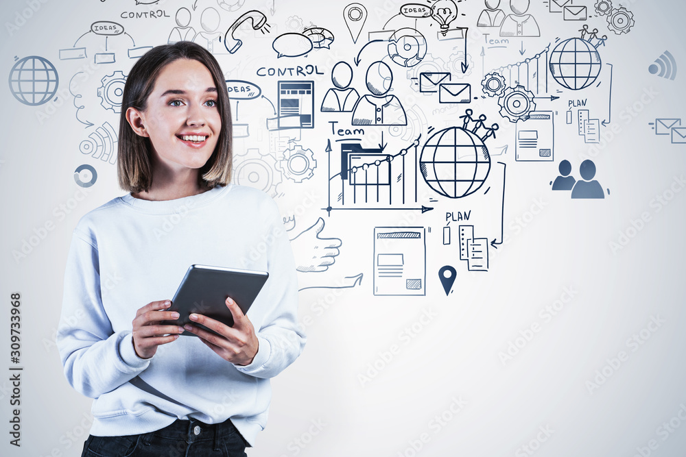 Woman with tablet and her business plan