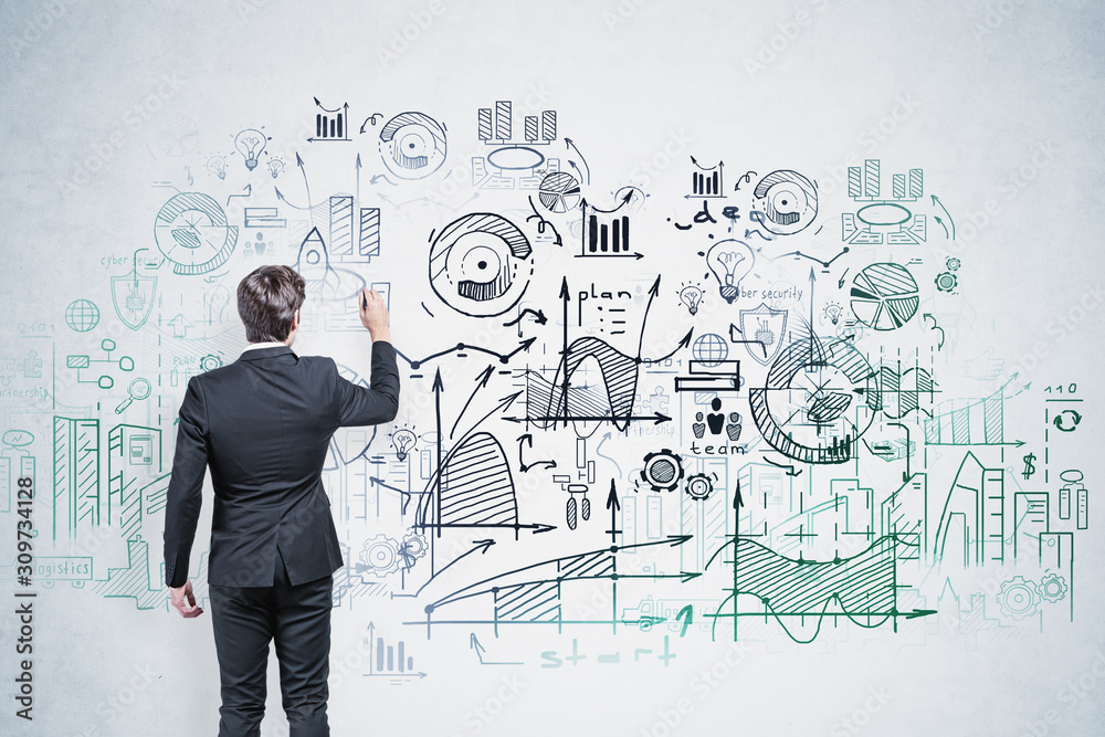 Businessman drawing business plan sketch Businessman drawing business plan sketch