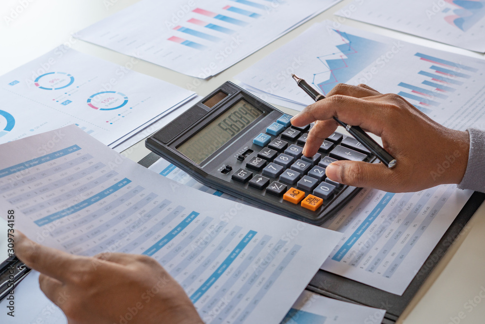 businessman working calculate data document graph chart report marketing research development  planning management strategy analysis financial accounting. Business office concept.