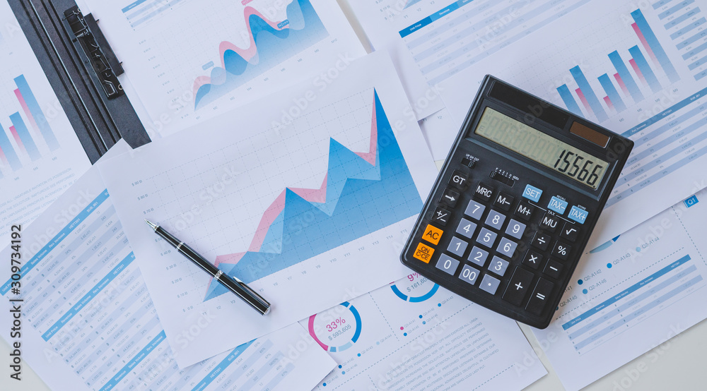 businessman working calculate data document graph chart report marketing research development planning management strategy analysis financial accounting. Business office concept. businessman working calculate data document graph chart report marketing research development planning management strategy analysis financial accounting. Business office concept.