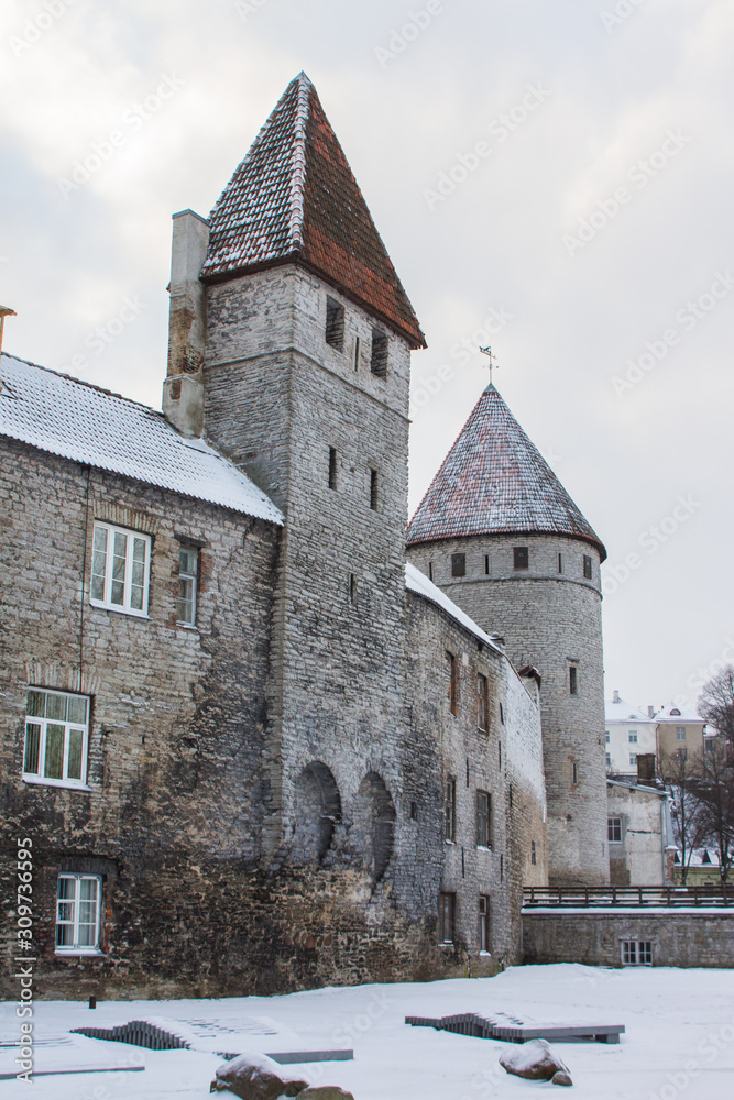 Historic defense towers in Old Town of Tallin in winter. Estonia