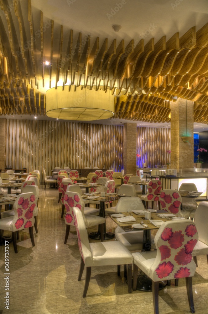 beautiful restaurant interior design with table seating and lighting and other furniture