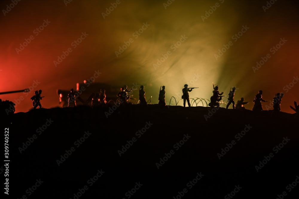 War Concept. Military silhouettes fighting scene on war fog sky background, World War German Tanks Silhouettes Below Cloudy Skyline At night. Attack scene. Armored vehicles and infantry. War Concept. Military silhouettes fighting scene on war fog sky background, World War German Tanks Silhouettes Below Cloudy Skyline At night. Attack scene. Armored vehicles and infantry.