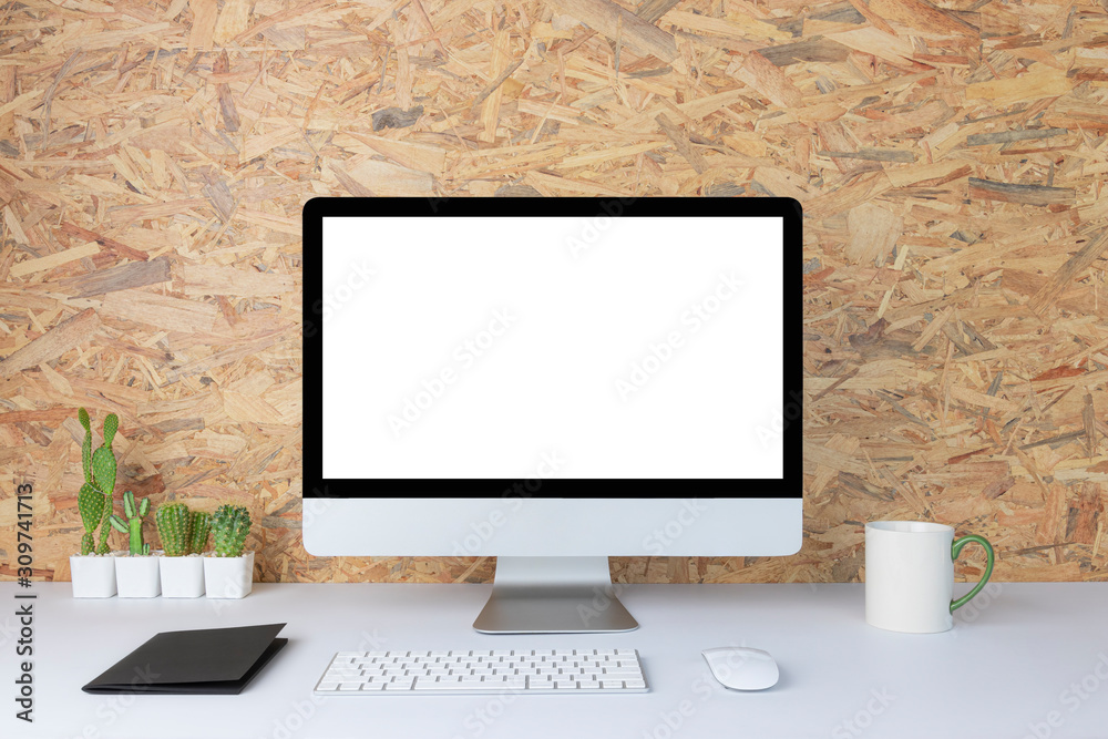 Fototapeta premium Computer with blank white copy space for text, Mockup design desktop computer in office on white table with keyboard and Coffee cub, Work place concept, Cactus in pot.