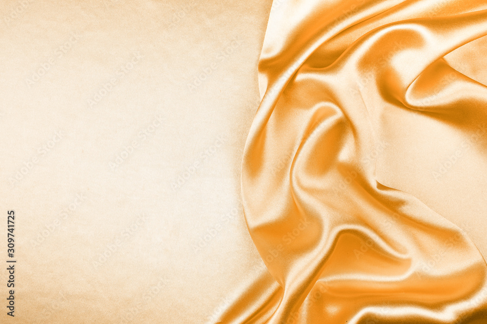 Golden silk texture luxurious satin for abstract background, fabric Golden silk texture luxurious satin for abstract background, fabric
