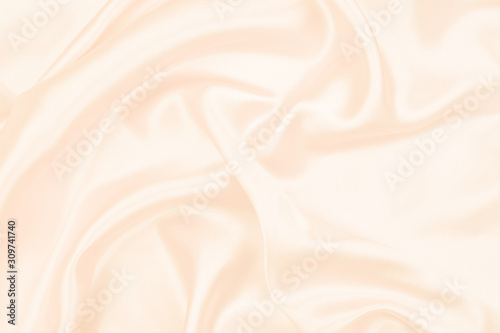 beautiful cream silk texture luxurious satin for abstract background. fabric